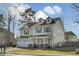 Inviting two-story home featuring a classic design and attached two-car garage at 314 Foxbank Plantation Blvd, Moncks Corner, SC 29461