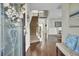 Inviting foyer with hardwood floors and staircase leading to the upper level at 314 Foxbank Plantation Blvd, Moncks Corner, SC 29461