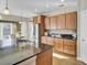 Kitchen with stainless steel appliances, granite countertops and cozy breakfast nook at 314 Foxbank Plantation Blvd, Moncks Corner, SC 29461