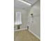Functional laundry room with neutral tones, ample space, and a window for natural light at 314 Foxbank Plantation Blvd, Moncks Corner, SC 29461