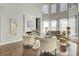 Inviting living room with high ceilings, fireplace, hardwood floors, and neutral furnishings at 314 Foxbank Plantation Blvd, Moncks Corner, SC 29461