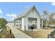 Open-air pavilion by the lake equipped with picnic tables and grills, offering a serene spot for outdoor gatherings at 314 Foxbank Plantation Blvd, Moncks Corner, SC 29461