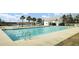 Well-maintained community pool with marked lanes, and poolside pergolas for shade and relaxation at 314 Foxbank Plantation Blvd, Moncks Corner, SC 29461