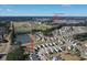 This aerial shows the home and the nearby Publix Shopping Center as well as neighborhood amenities at 317 Cantley Ct, Summerville, SC 29486