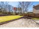 Backyard featuring a patio, green grass, mulch area and a privacy fence at 317 Cantley Ct, Summerville, SC 29486