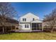 Exterior view of the backyard and a screened in porch with a patio at 317 Cantley Ct, Summerville, SC 29486