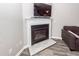 Close up on a living room fireplace with tile details and modern flooring at 317 Cantley Ct, Summerville, SC 29486