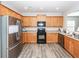 Functional kitchen with stainless steel appliances and plenty of cabinet storage at 317 Cantley Ct, Summerville, SC 29486