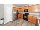 Well-appointed kitchen featuring stainless steel appliances and ample cabinet space at 317 Cantley Ct, Summerville, SC 29486
