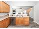 Kitchen view showing stainless steel appliances, sink, and view into the living room at 317 Cantley Ct, Summerville, SC 29486