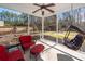 Screened in porch featuring comfortable seating and a ceiling fan at 317 Cantley Ct, Summerville, SC 29486