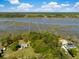 Amazing aerial view showcasing the waterfront property, private docks, and lush landscaping at 3398 Freeman Hill Rd, Johns Island, SC 29455