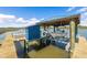 Modern boat lift offers convenient storage and maintenance, while providing easy access to the serene waterway at 3398 Freeman Hill Rd, Johns Island, SC 29455