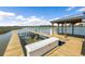 Private wooden dock features a covered gazebo, boat lift and easy access to the waterway at 3398 Freeman Hill Rd, Johns Island, SC 29455