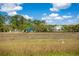 A view of the marsh with a house in the background at 3398 Freeman Hill Rd, Johns Island, SC 29455