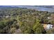 Aerial view of the homesite showing proximity to the nature preserve, surrounding homes and marsh views at 3434 Kit Freeman Ln, Johns Island, SC 29455