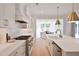 Modern kitchen featuring stainless steel appliances, quartz countertops, and ample cabinet space at 3434 Kit Freeman Ln, Johns Island, SC 29455