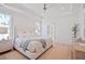 Bright main bedroom with a ceiling fan, plush carpet, and plenty of natural light at 3434 Kit Freeman Ln, Johns Island, SC 29455
