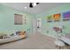 Cheerful bedroom with playful decorations, including educational posters and mushroom decals on the wall at 3676 Shutesbury St, Mount Pleasant, SC 29466