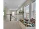 Hallway featuring bright sunlight, clean carpets, and toys at 3676 Shutesbury St, Mount Pleasant, SC 29466