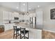 Bright kitchen with a large island, granite countertops, stainless steel appliances, and ample cabinet space at 3676 Shutesbury St, Mount Pleasant, SC 29466