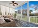 Cozy screened porch with comfortable seating and an outdoor view at 3676 Shutesbury St, Mount Pleasant, SC 29466