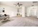 Large bonus room with carpet flooring, a ceiling fan, and a storage nook at 406 Butterfly Bush Dr, Goose Creek, SC 29445