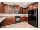 Kitchen with dark wood cabinets, granite countertops, stainless steel appliances at 406 Butterfly Bush Dr, Goose Creek, SC 29445