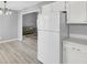 Bright kitchen featuring white appliances and cabinets at 4064 Bonaparte Dr, North Charleston, SC 29418