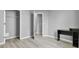 Spacious room with three doors and neutral paint at 4064 Bonaparte Dr, North Charleston, SC 29418