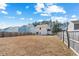 A large backyard with a fence creates a secure and private outdoor space at 464 Fox Sparrow Ct, Summerville, SC 29486