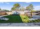 Spacious backyard with artificial turf and games; ideal for outdoor fun at 5034 Pittman St, North Charleston, SC 29405