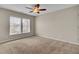 Bedroom featuring carpeted floors, a ceiling fan, and a large window with blinds at 518 Mountain Laurel Cir, Goose Creek, SC 29445