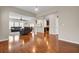 Open-concept living room featuring hardwood floors and plenty of natural light at 518 Mountain Laurel Cir, Goose Creek, SC 29445