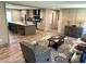 Cozy living room showcases modern decor, hardwood floors, a stylish rug, and a comfortable seating arrangement at 5355 Old Military Rd, Adams Run, SC 29426