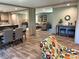 Bright and airy living space seamlessly flowing into the dining and kitchen areas at 5355 Old Military Rd, Adams Run, SC 29426