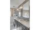 Bathroom featuring a double vanity with marble countertop and large mirrors at 54 Gibbes St, Charleston, SC 29401
