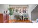 Bedroom features a cozy reading nook with natural light from bright windows, wood floors, and decor at 54 Gibbes St, Charleston, SC 29401