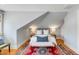 Cozy bedroom space with wood floors and a comfortable bed, with stylish decorations and side tables at 54 Gibbes St, Charleston, SC 29401