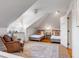 Bedroom with vaulted ceilings, chandelier, hardwood floors, and natural light at 54 Gibbes St, Charleston, SC 29401