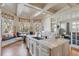 Inviting breakfast nook with a glass table and views to the kitchen at 54 Gibbes St, Charleston, SC 29401