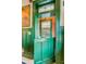 Hallway with green wainscoting and a Dutch door feature at 54 Gibbes St, Charleston, SC 29401