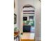 Living room with archway and view of the living space and wainscoting at 54 Gibbes St, Charleston, SC 29401