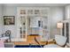 View from living room into kitchen with white cabinets at 54 Gibbes St, Charleston, SC 29401