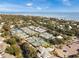 Great view of Tennis Courts surrounded by lush landscaping in the community near the ocean at 5802 Palmetto Dr # B-202, Isle of Palms, SC 29451
