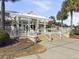 Charming Harbor Golf Pro Shop club house with welcoming entrance and bright, airy design at 5802 Palmetto Dr # B-202, Isle of Palms, SC 29451