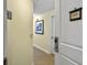 A welcoming entryway with light walls, art, and unit number 202B at 5802 Palmetto Dr # B-202, Isle of Palms, SC 29451