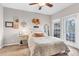 Cozy bedroom with lots of natural light, fan, and access to the patio at 700 Daniel Ellis Dr # 14206, Charleston, SC 29412