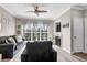 Cozy living room with a modern fireplace and large windows at 700 Daniel Ellis Dr # 14206, Charleston, SC 29412