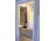 Neutral-toned bathroom with a shower, toilet, closet, and blue accent rug at 700 Daniel Ellis Dr # 6107, Charleston, SC 29412